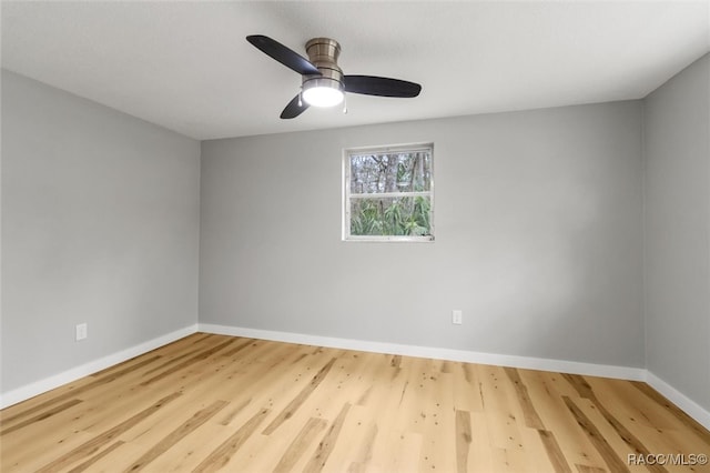 unfurnished room with hardwood / wood-style floors