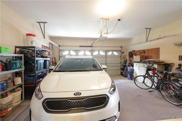 garage featuring a garage door opener