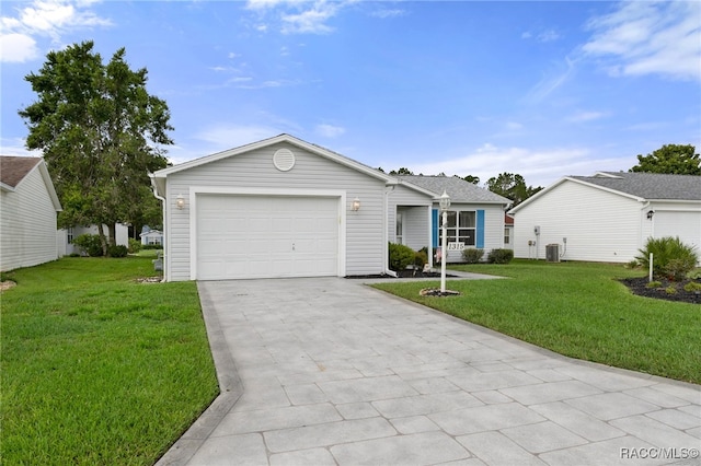 ranch-style house with central AC unit, a front yard, and a garage