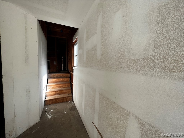 stairs with concrete floors