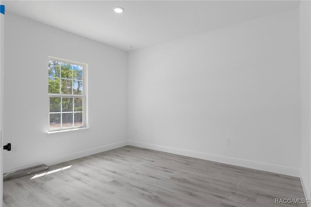 1083 W Cary Dr, Citrus Springs, FL 34434 - empty room with recessed lighting, wood finished floors, and baseboards