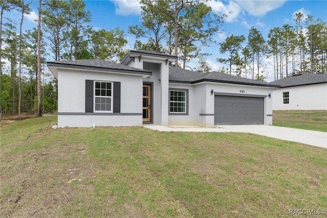 1083 W Cary Dr, Citrus Springs, FL 34434 - prairie-style home featuring stucco siding, a front lawn, concrete driveway, and a garage