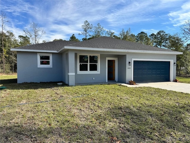 ranch-style home with a front yard and a garage