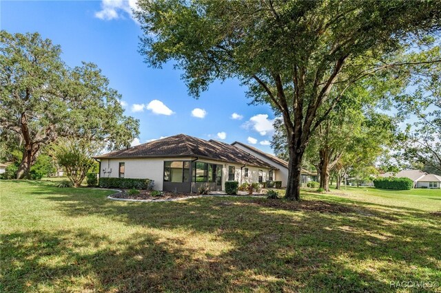 exterior space featuring a front lawn