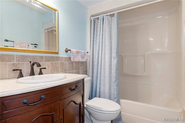 full bathroom with shower / bath combination with curtain, vanity, toilet, and tile walls