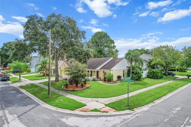 ranch-style home with a front yard