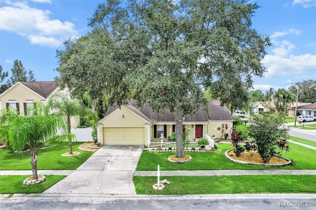 ranch-style house with a front lawn and a garage