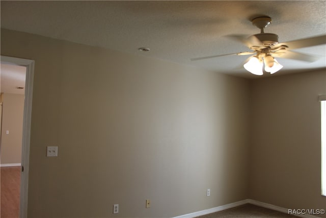 empty room with ceiling fan