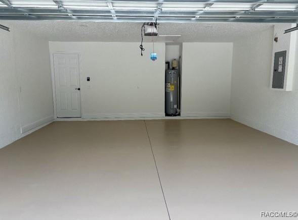 3289 W Camilo Dr, Dunnellon, FL 34433 - garage with electric water heater, a garage door opener, and electric panel