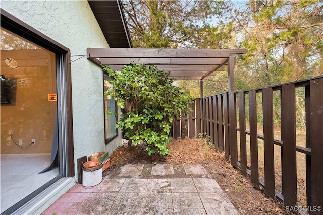 view of patio featuring a pergola