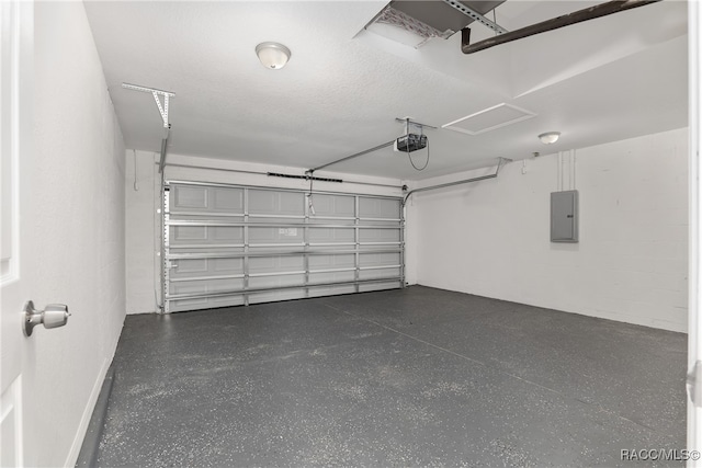 garage with electric panel and a garage door opener