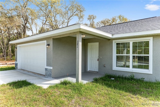 property entrance with a garage