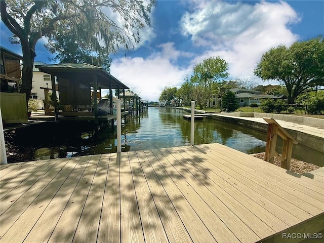 dock area featuring a water view