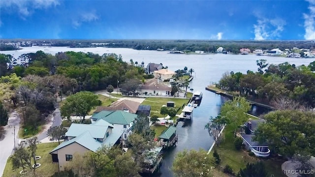 aerial view featuring a residential view and a water view
