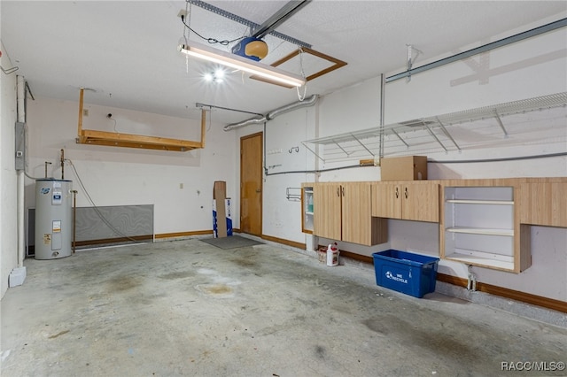 garage with electric water heater and a garage door opener