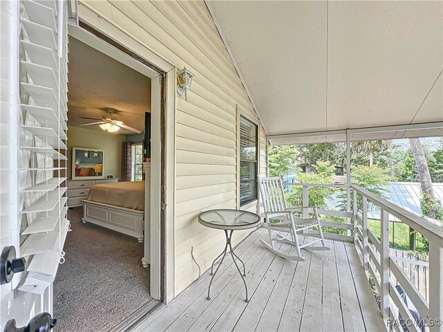 857 N Palm Springs Ter, Crystal River, FL 34429 - wooden terrace featuring a porch