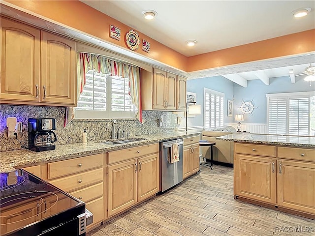 857 N Palm Springs Ter, Crystal River, FL 34429 - kitchen with stainless steel dishwasher, a sink, beam ceiling, light brown cabinetry, and recessed lighting