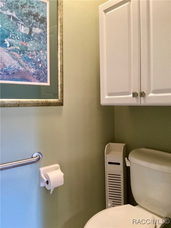 bathroom featuring toilet