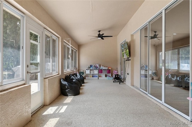 sunroom with vaulted ceiling and ceiling fan