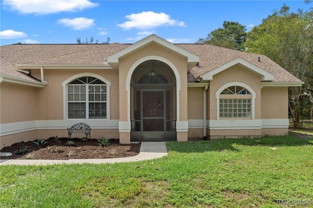 exterior space featuring a front yard