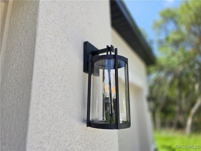 8 Calendula Ct, Homosassa, FL 34446 - exterior view of stucco siding