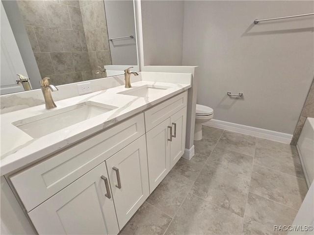 8 Calendula Ct, Homosassa, FL 34446 - full bath featuring toilet, double vanity, and baseboards