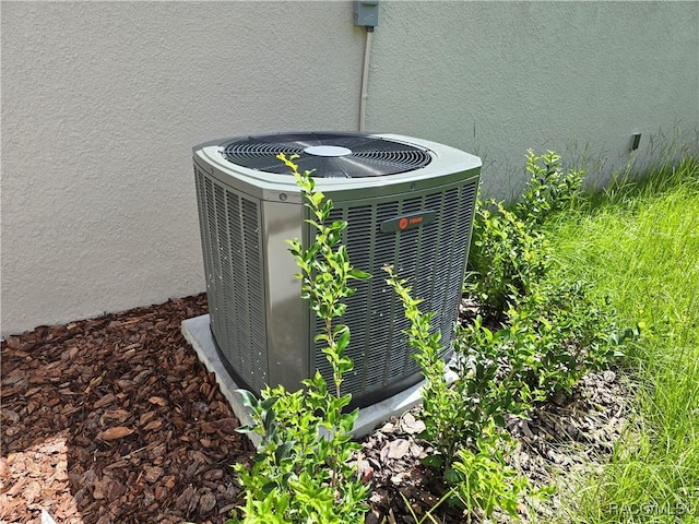 8 Calendula Ct, Homosassa, FL 34446 - exterior view of central air condition unit and stucco siding