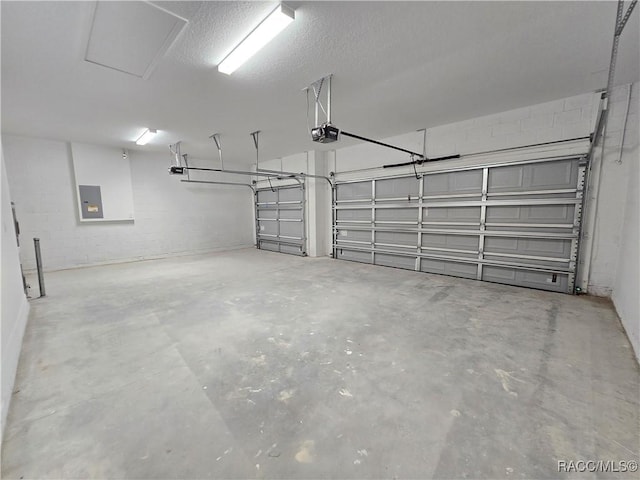 8 Calendula Ct, Homosassa, FL 34446 - garage with a garage door opener, electric panel, and concrete block wall