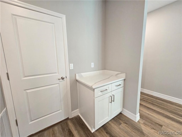 8 Calendula Ct, Homosassa, FL 34446 - detailed view of wood finished floors and baseboards