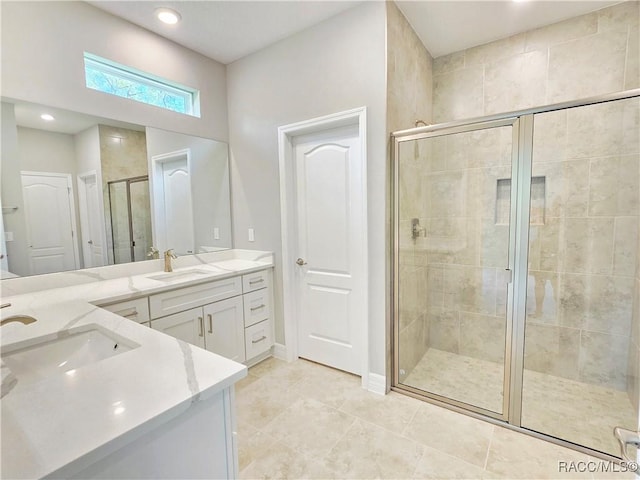 8 Calendula Ct, Homosassa, FL 34446 - full bathroom featuring double vanity, a shower stall, tile patterned floors, baseboards, and recessed lighting