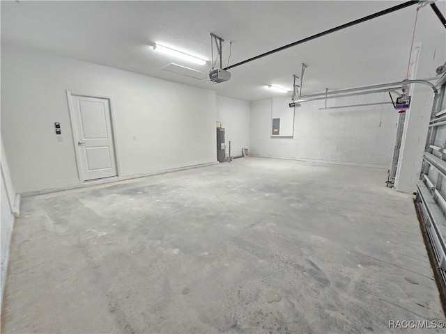 8 Calendula Ct, Homosassa, FL 34446 - garage featuring a garage door opener, electric panel, and water heater