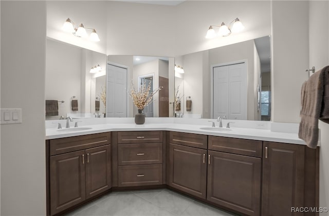 bathroom featuring tile patterned floors and vanity