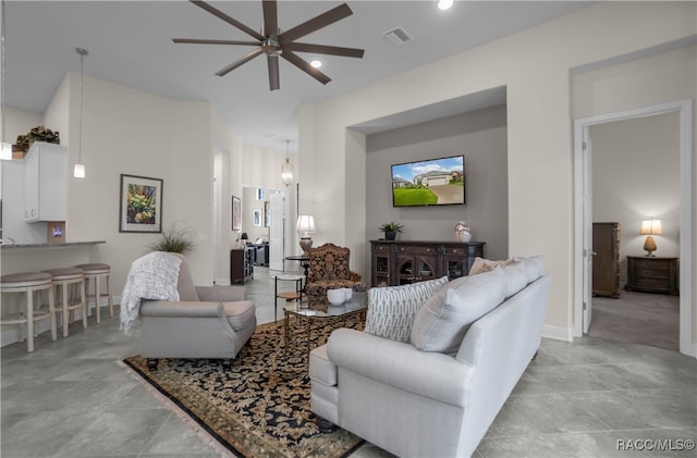 living room with ceiling fan