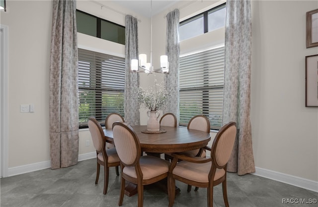 dining space with a chandelier and a wealth of natural light