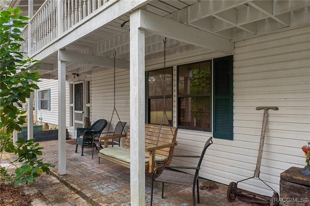 view of patio / terrace with a balcony