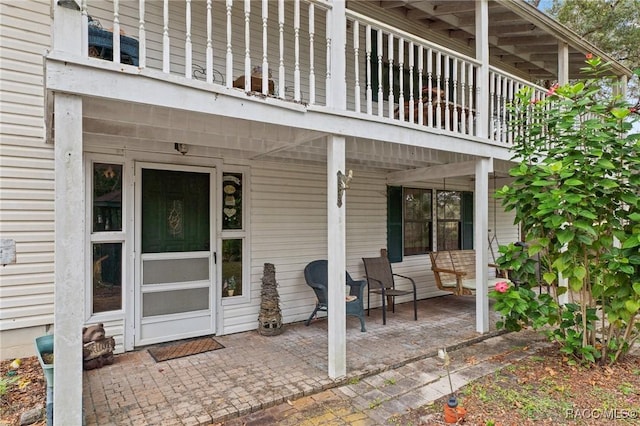 view of patio / terrace featuring a balcony