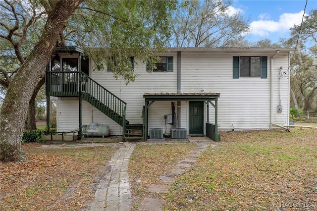 view of front of property with cooling unit