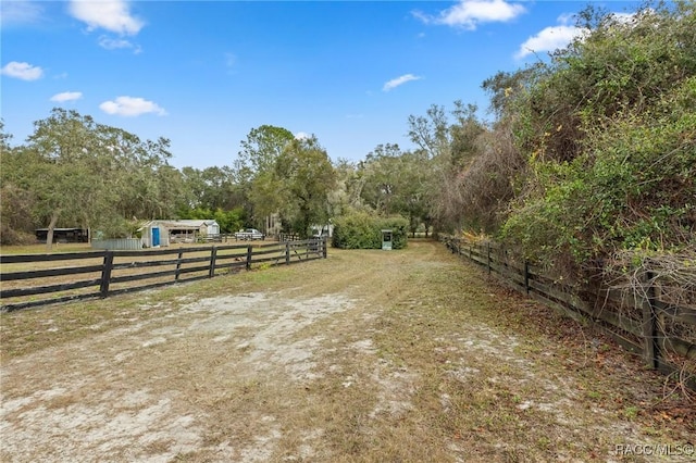 view of yard featuring a rural view