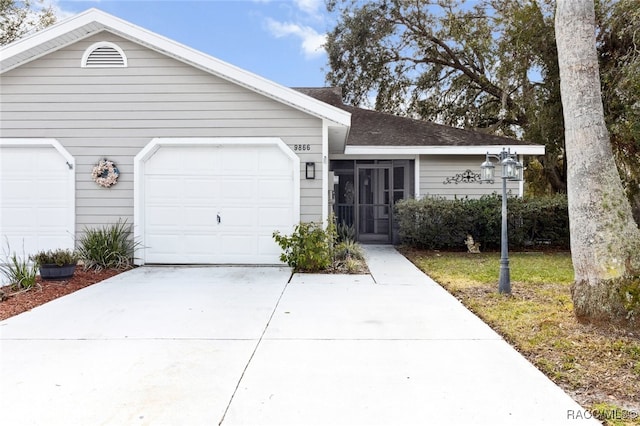 single story home with a garage