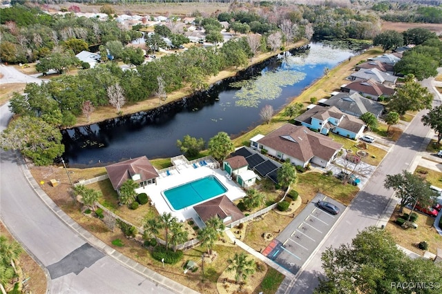 drone / aerial view with a water view