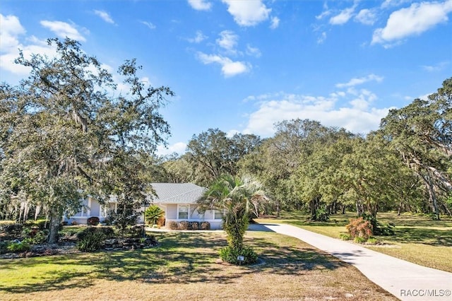 view of front of property with a front lawn