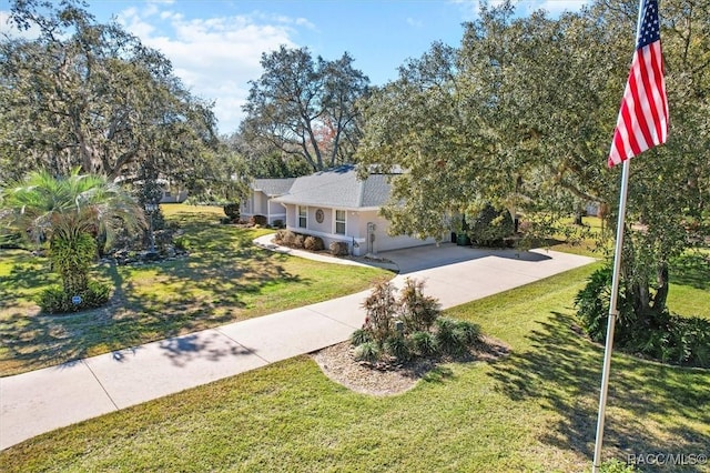 view of front of property with a front lawn