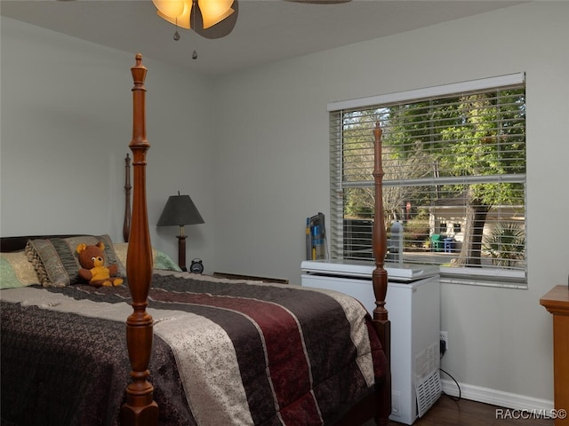 bedroom featuring ceiling fan and hardwood / wood-style floors