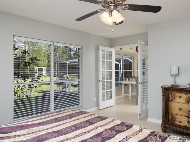 bedroom featuring ceiling fan and light tile patterned floors