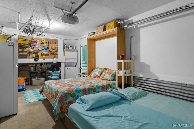 bedroom with concrete flooring and a textured ceiling