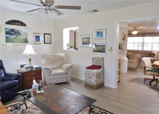 living room with light hardwood / wood-style floors