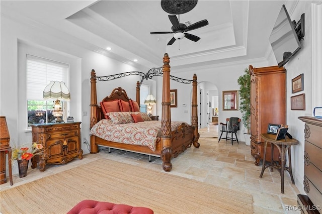 12380 SW 140th Loop, Dunnellon, FL 34432 - bedroom with arched walkways, stone tile floors, a raised ceiling, recessed lighting, and ornamental molding