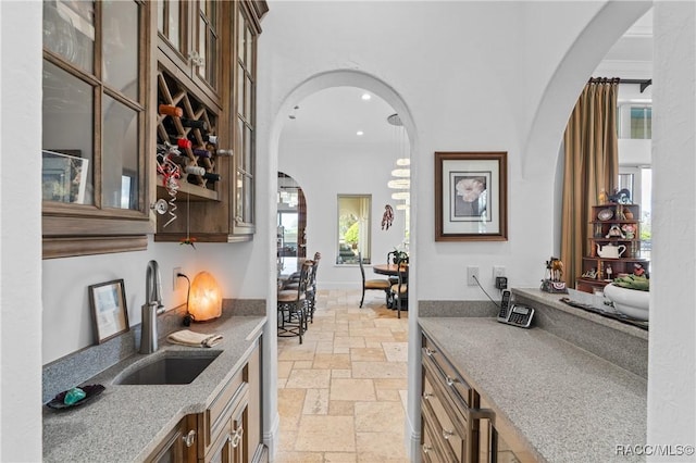 12380 SW 140th Loop, Dunnellon, FL 34432 - bar with a sink, stone tile floors, and recessed lighting
