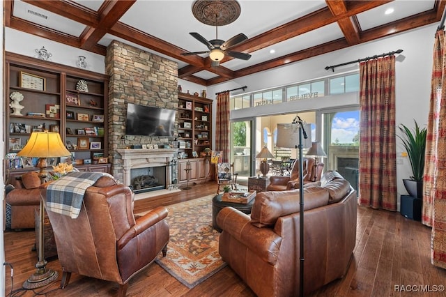 12380 SW 140th Loop, Dunnellon, FL 34432 - living area featuring a fireplace, coffered ceiling, a ceiling fan, beam ceiling, and hardwood / wood-style floors