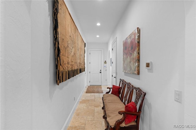 12380 SW 140th Loop, Dunnellon, FL 34432 - hall featuring recessed lighting, stone tile floors, and baseboards